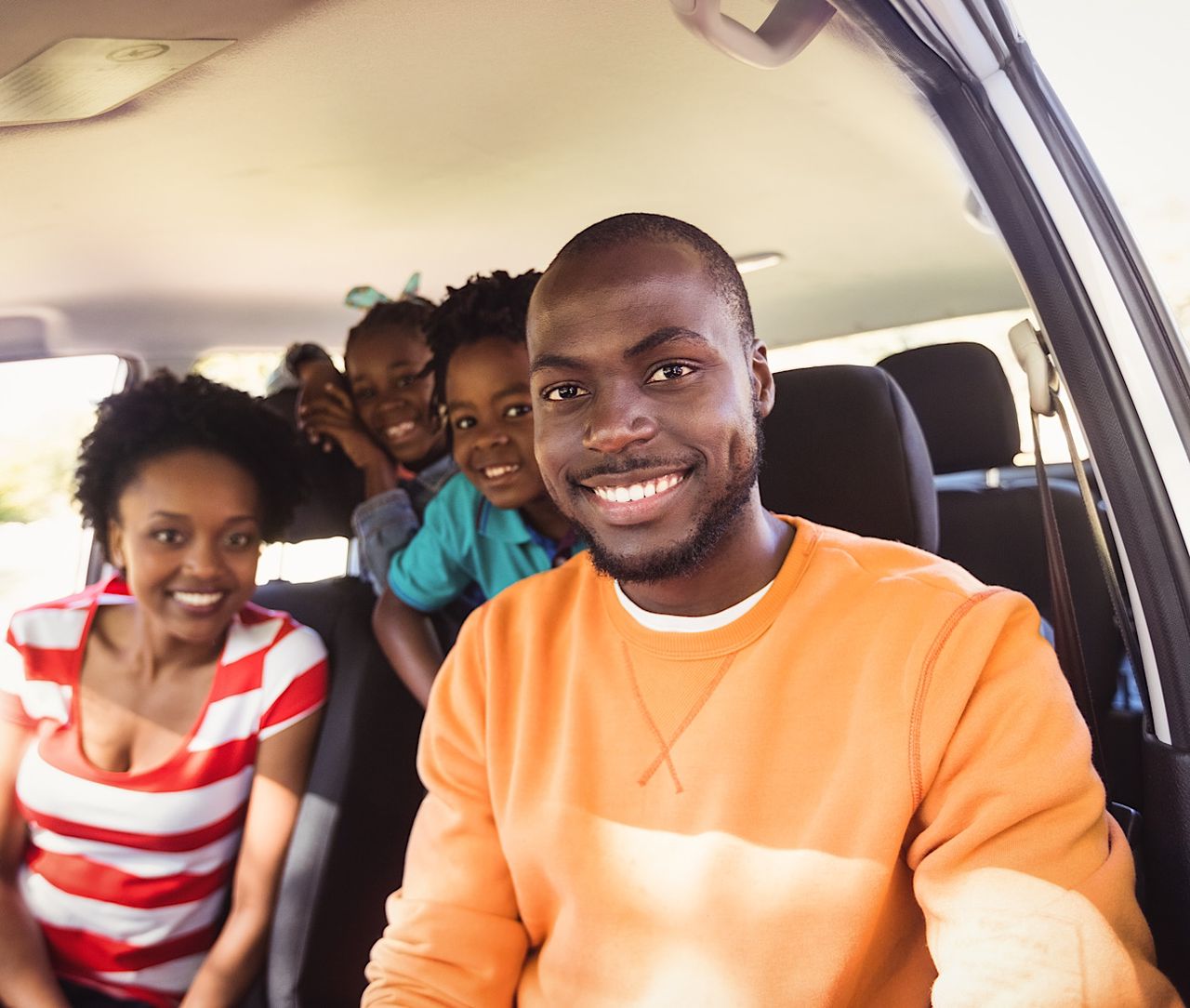 Joyful Family Road Trip Adventure Inside Car by Wavebreakmedia